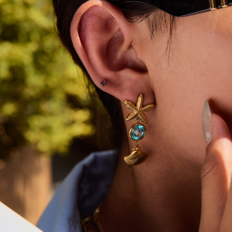 J&D Niche Funky 18K Gold Stainless Steel Transparent Blue Faceted Glass Starfish Shell Earrings - Image 3