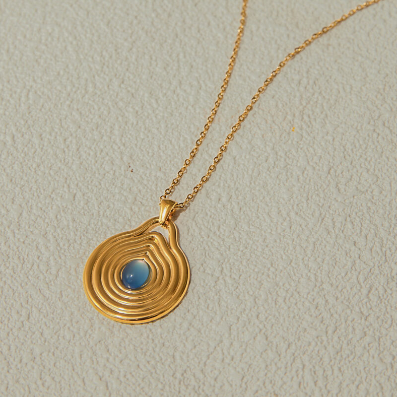 J&D Waterproof Stainless Steel PVD Gold Plating Spiral Bur Texture Smooth Blue Moonlight Resin Stone Pendant Necklace - Image 4