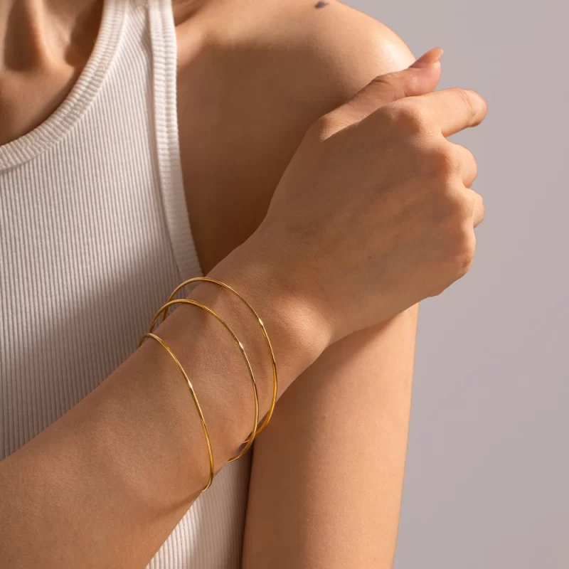 Wholesale Single Layer Simple Shaped Thin Loop 18k Gold-Plated Stainless Steel Slender Bracelet for Girls - Image 3