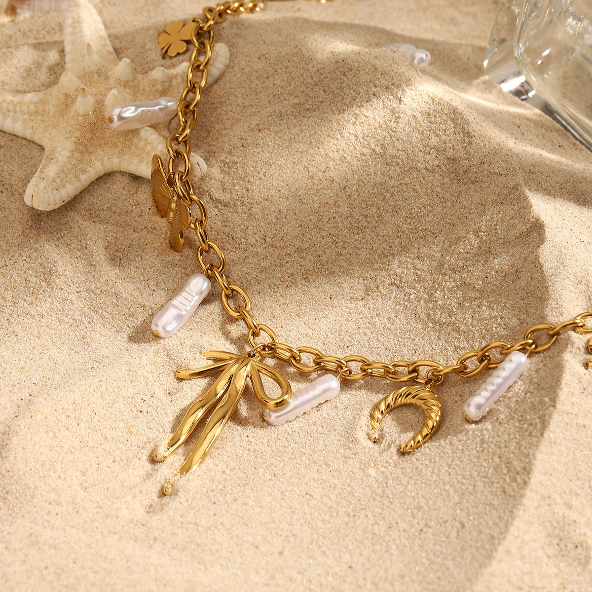 J&D Stainless Steel 18K PVD Gold Plating Ocean Beach Horse Hoof Butterfly Knot Four Leaf Clover Necklace