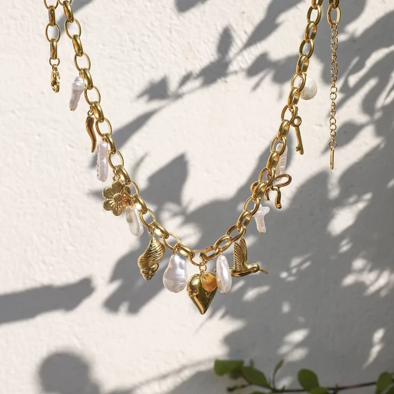 J&D Stainless Steel 18K PVD Gold Plating Ocean Red Pepper Imitation Pearl Butterfly Knot Love Peace Bird Flower Necklace - Image 5