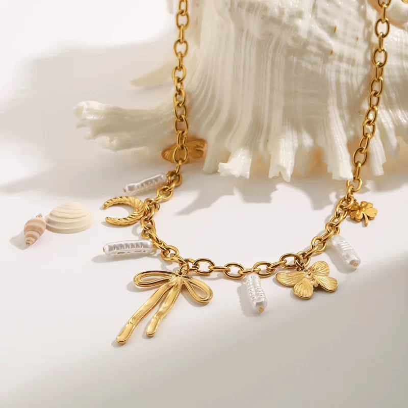 J&D Stainless Steel 18K PVD Gold Plating Ocean Beach Horse Hoof Butterfly Knot Four Leaf Clover Necklace - Image 5