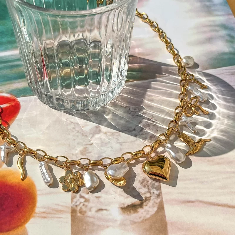 J&D Stainless Steel 18K PVD Gold Plating Ocean Red Pepper Imitation Pearl Butterfly Knot Love Peace Bird Flower Necklace - Image 4