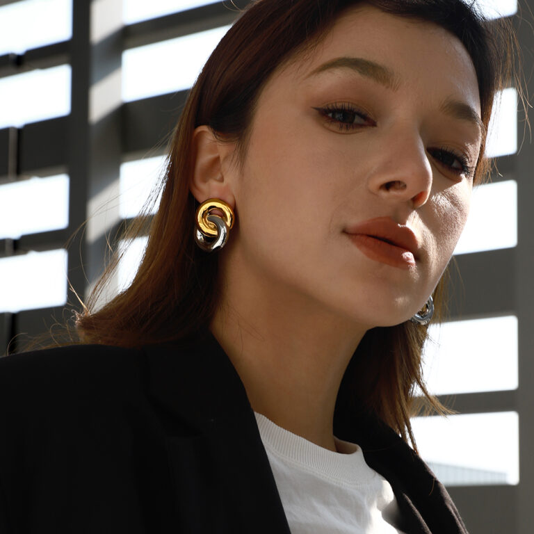 Minimalist Women's 18K Gold Two-Tone Stainless Steel Smooth 8-Shaped Hoop Earrings Pair - Image 3